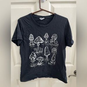 Black mushroom t-shirt.
